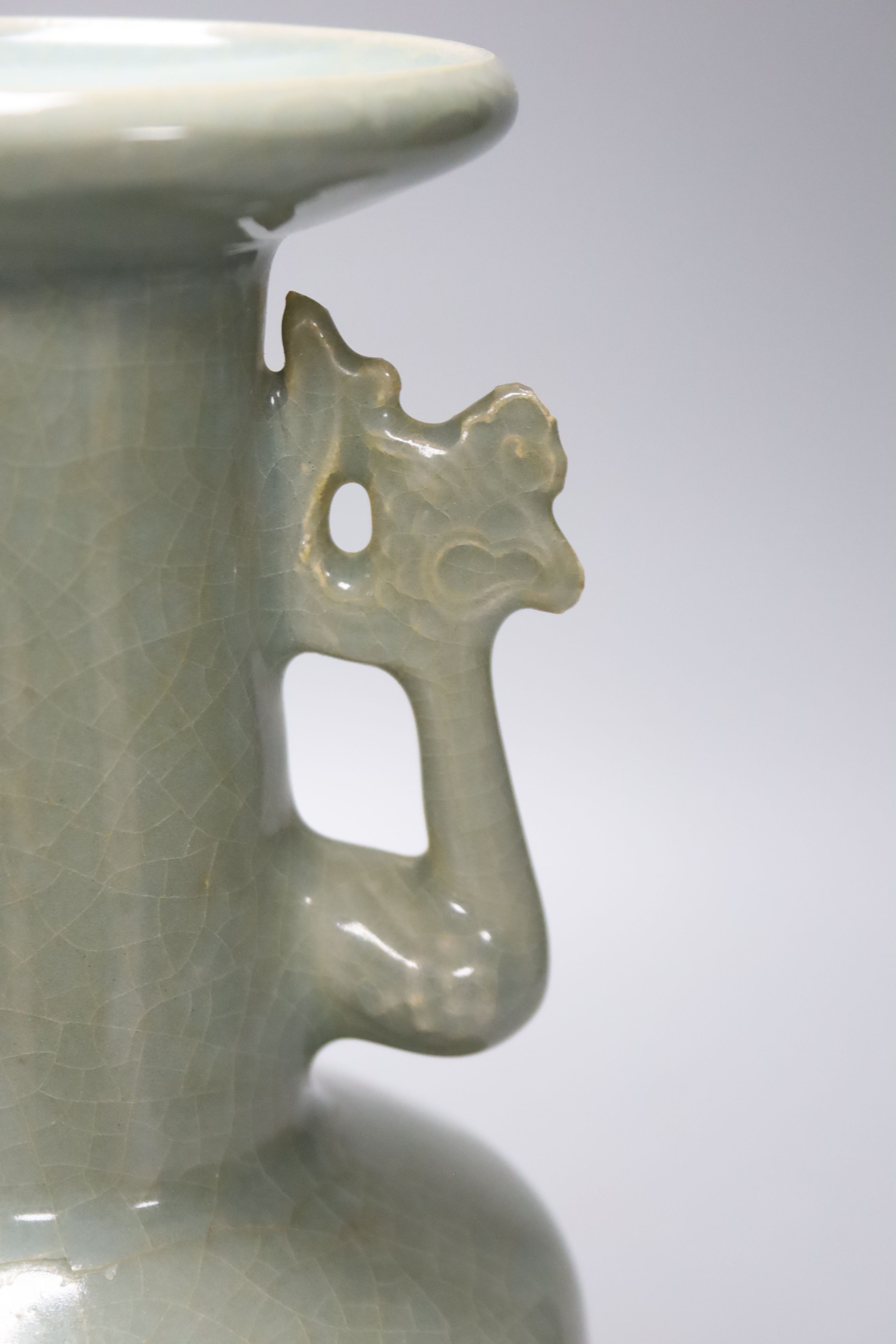 A celadon crackle-glaze twin handled vase, height 25cm